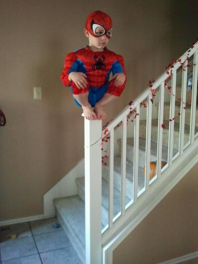 Spider Kid on the railing